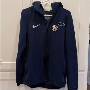 Full zip navy jacket with hood by NBA and Nike Collab DriFit for the Utah Jazz.